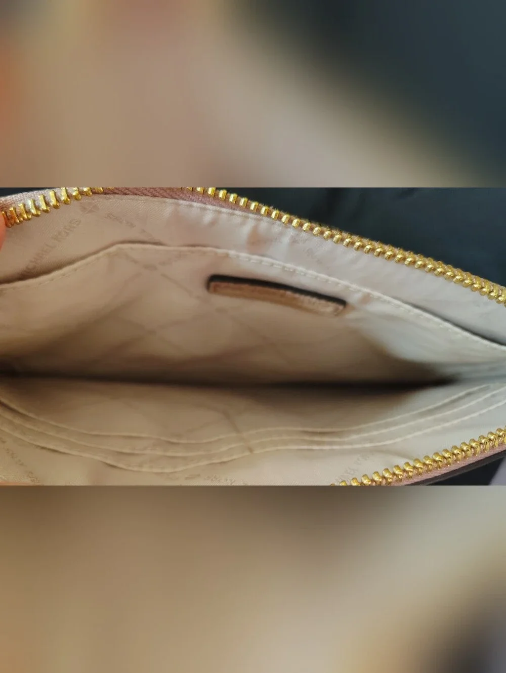 Michael Kors XL Wristlet Pebbled Leather with Gold Tone Lock Detail.